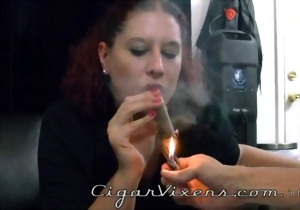 Busty babe in red panties smokes and plays with her vagina